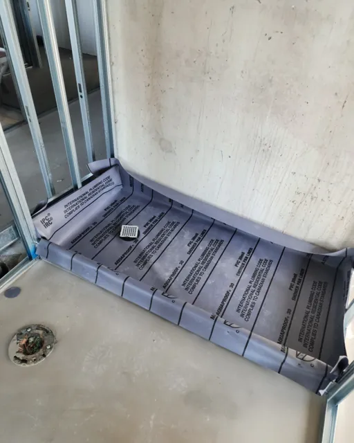Bathroom floor and drain during renovation preparation