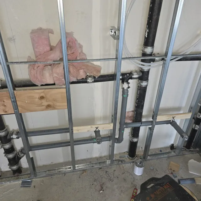 Water supply and drainage rough-in within steel framing
